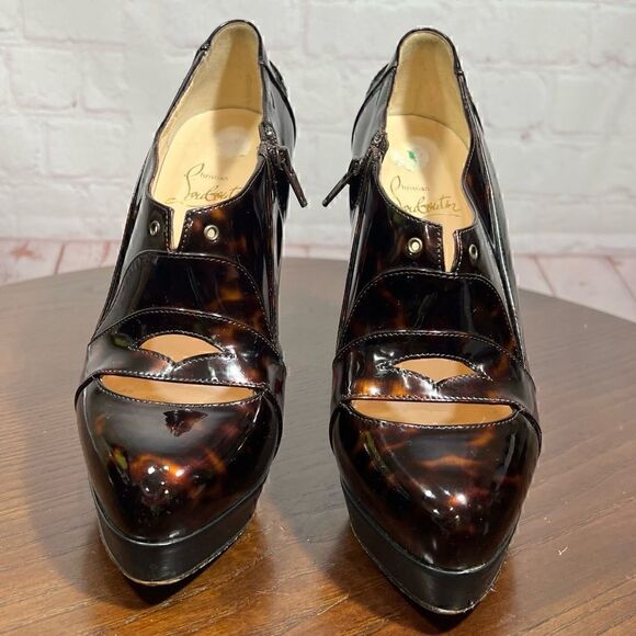 37 (7) CHRISTIAN LOUBOUTIN patent leather animal print lace up booties EUC - Picture 1 of 11